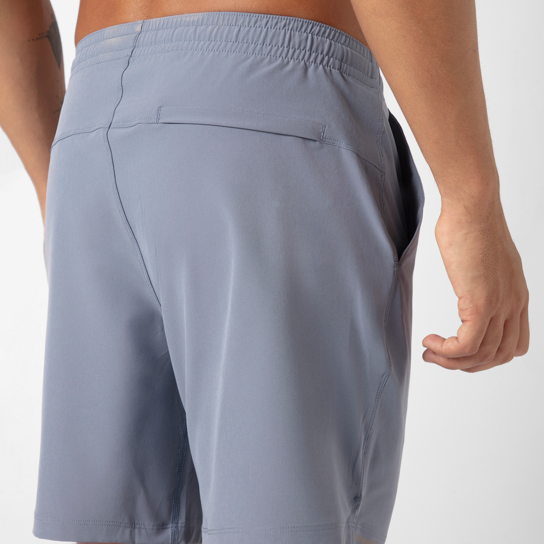 Run Short v2 7" in Flint back close up of zipper pocket on model