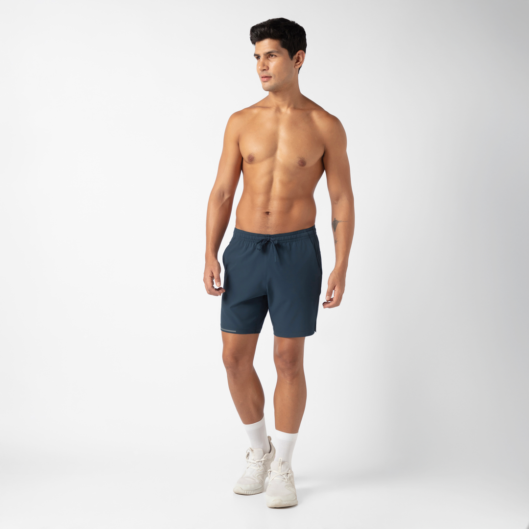 Run Short v2 7" Navy front on model standing and walking
