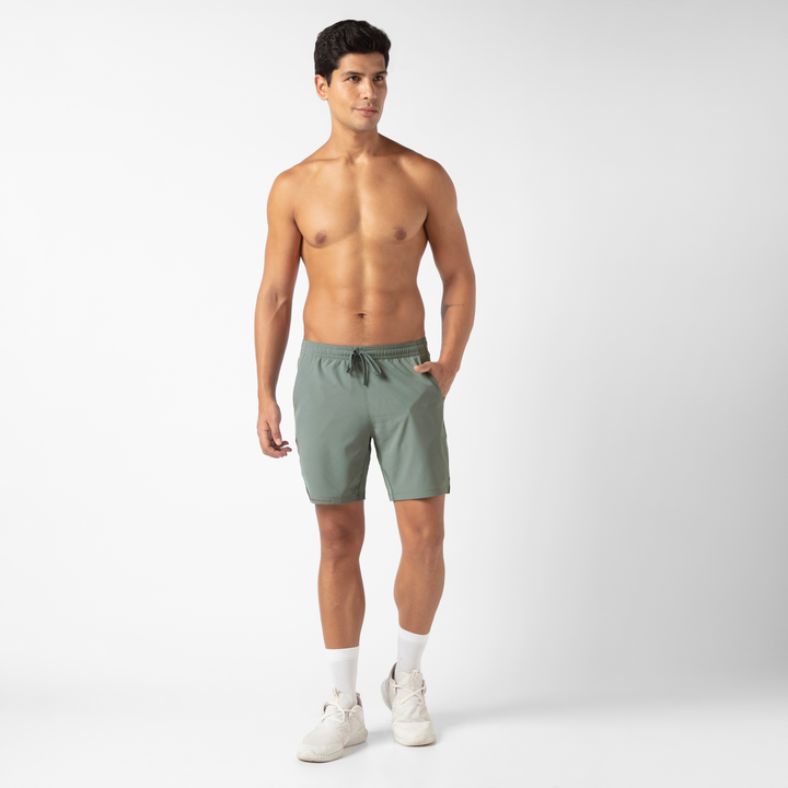 Run Short v2 7" in Shark Grey front on model standing with hand in front pocket