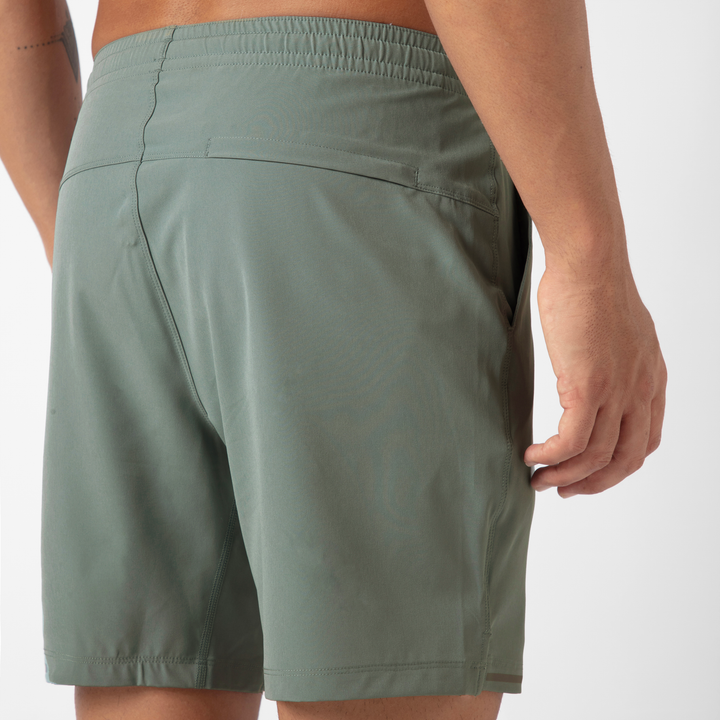 Run Short v2 7" in Shark Grey back close up of zipper pocket on model 