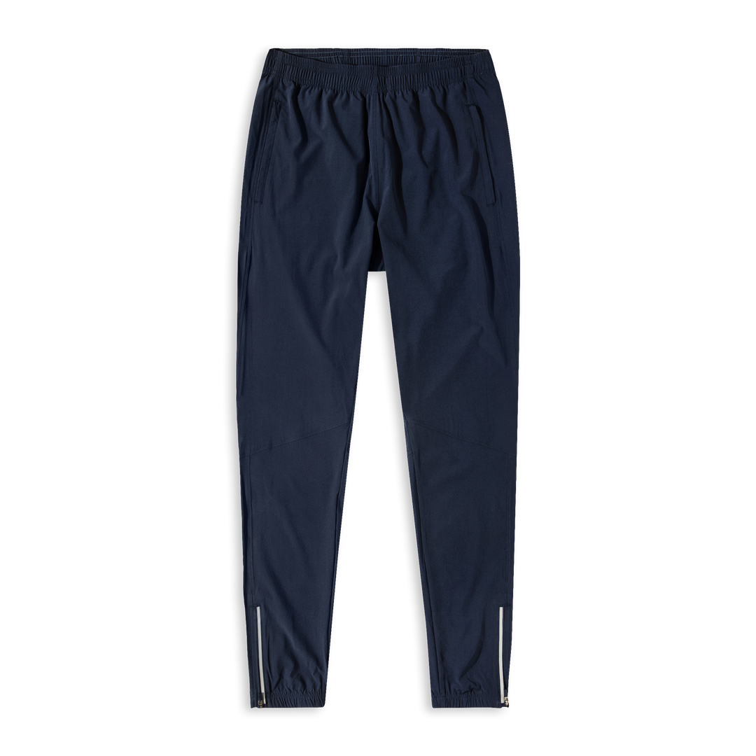 Run Jogger Navy front with Elastic Waistband, Zippered Side Pockets, Zipper at ankles, and Reflective strip at side seam/bottom hem