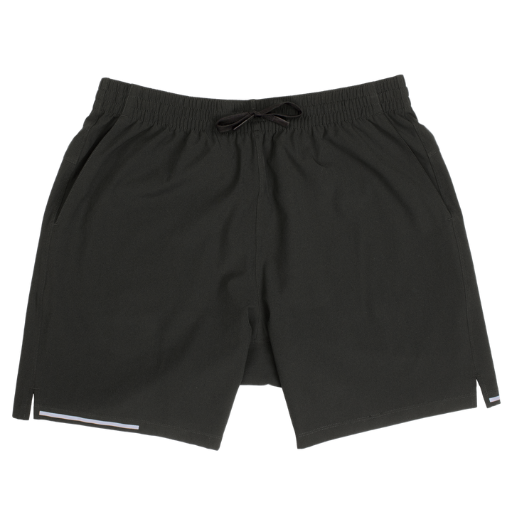 Run Short v2 7" Black front with elastic waistband, dyed-to-match drawstring with rubberized tips, two front pockets, split hem, and reflective line on bottom right hem