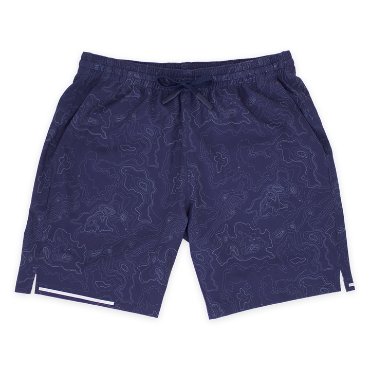 Run Short v2 7" Topo Navy front with elastic waistband, dyed-to-match drawstring with rubberized tips, two front pockets, split hem, and reflective line on bottom right hem