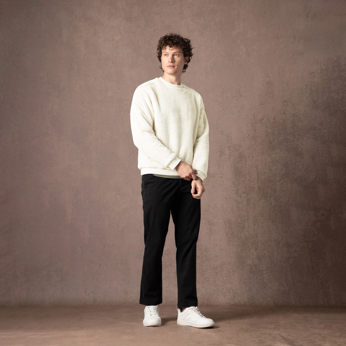 Sherpa Crewneck Bone full body on model on backdrop