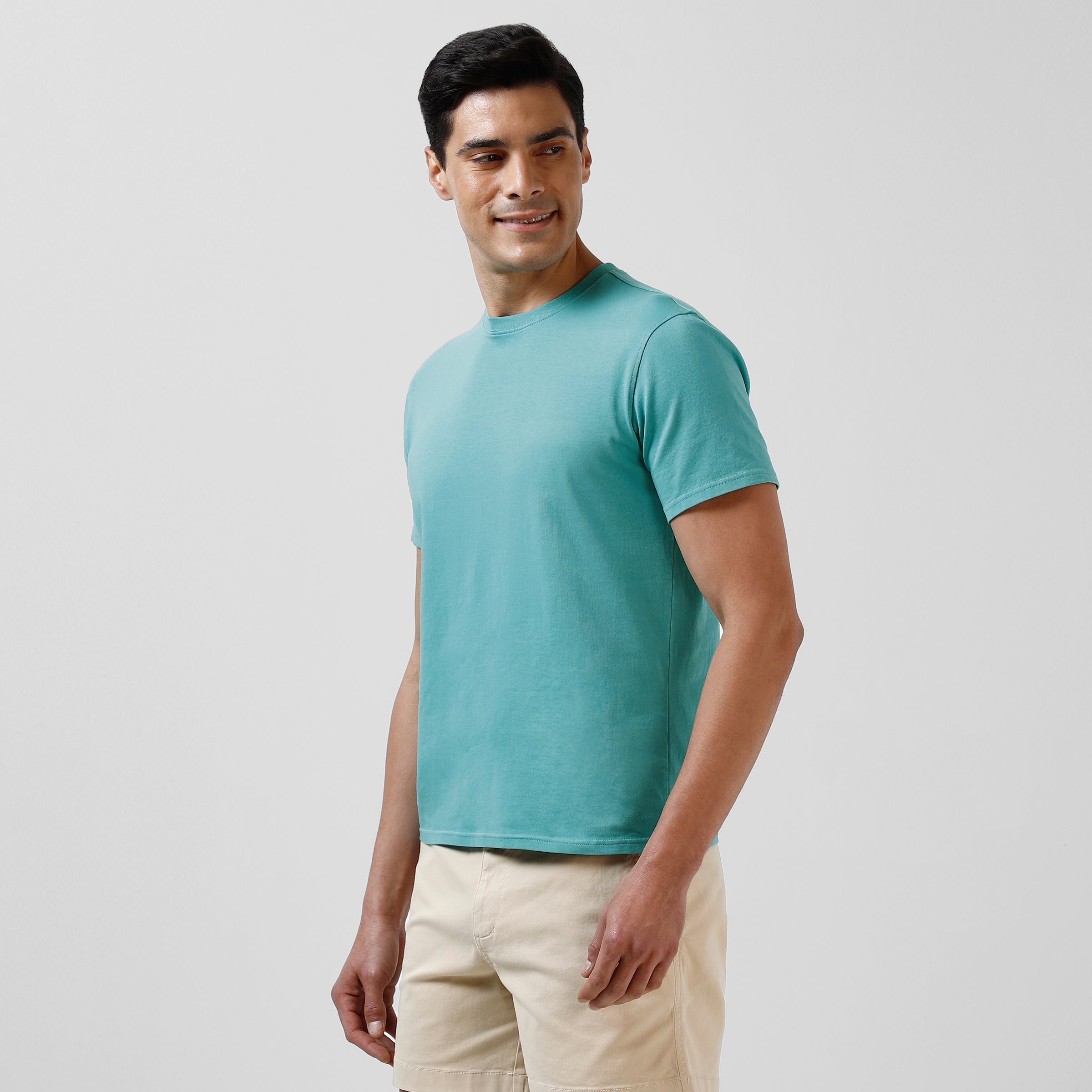 Natural Dye Tee Sea front left on model