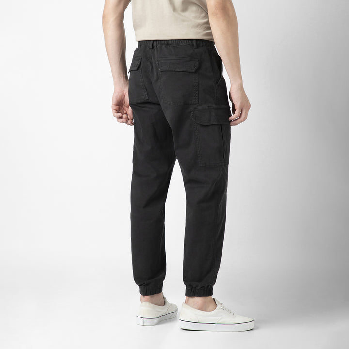 Model back facing wearing Stretch Cargo Joggers in Black