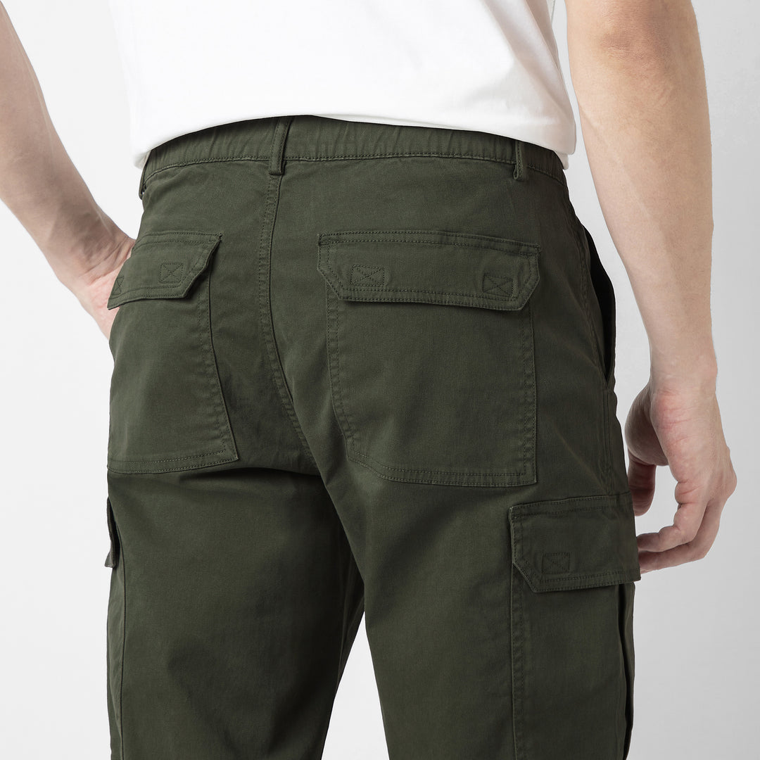Model back facing wearing Stretch Cargo Joggers in Military Green