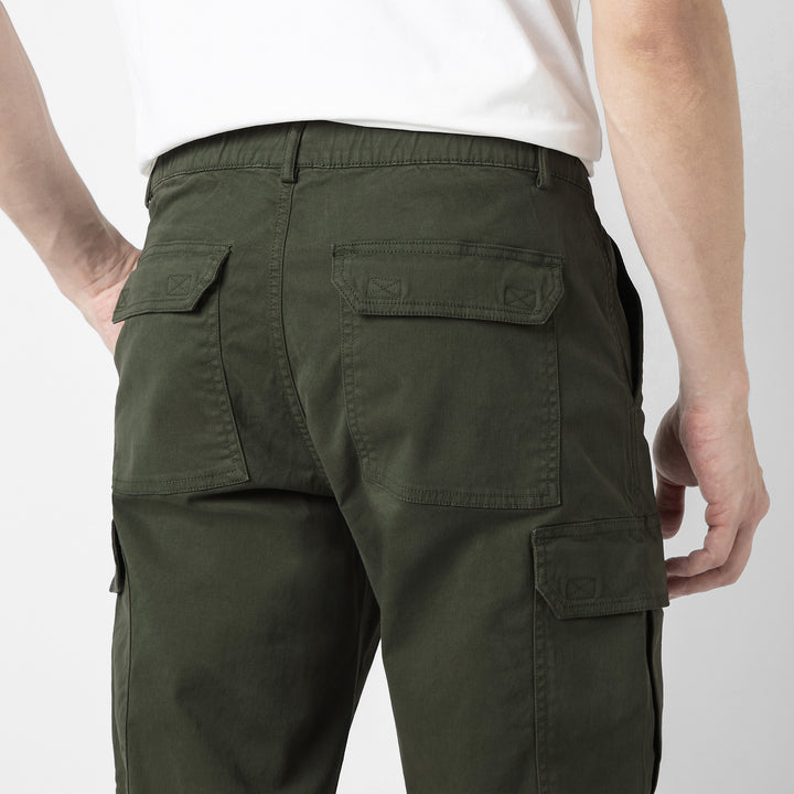 Model back facing wearing Stretch Cargo Joggers in Military Green