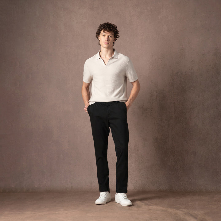 Stretch Chino Pant Black full body on model with backdrop