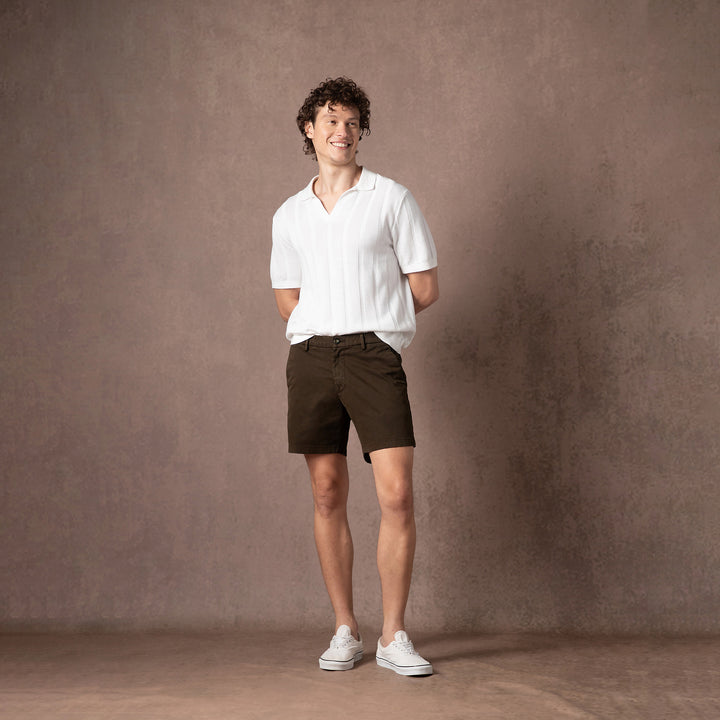 Stretch Chino Short 5.5" in Cocoa full body on model with backdrop
