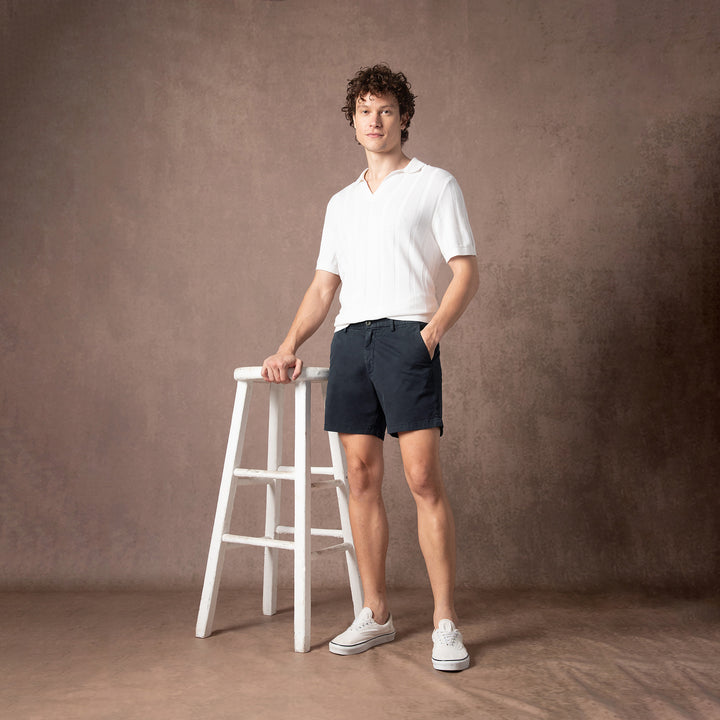 Stretch Chino Short 5" Navy full body on model with backdrop