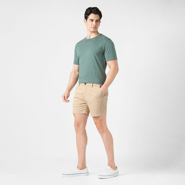 Stretch Chino Short 5" Sand Dune full body side on model