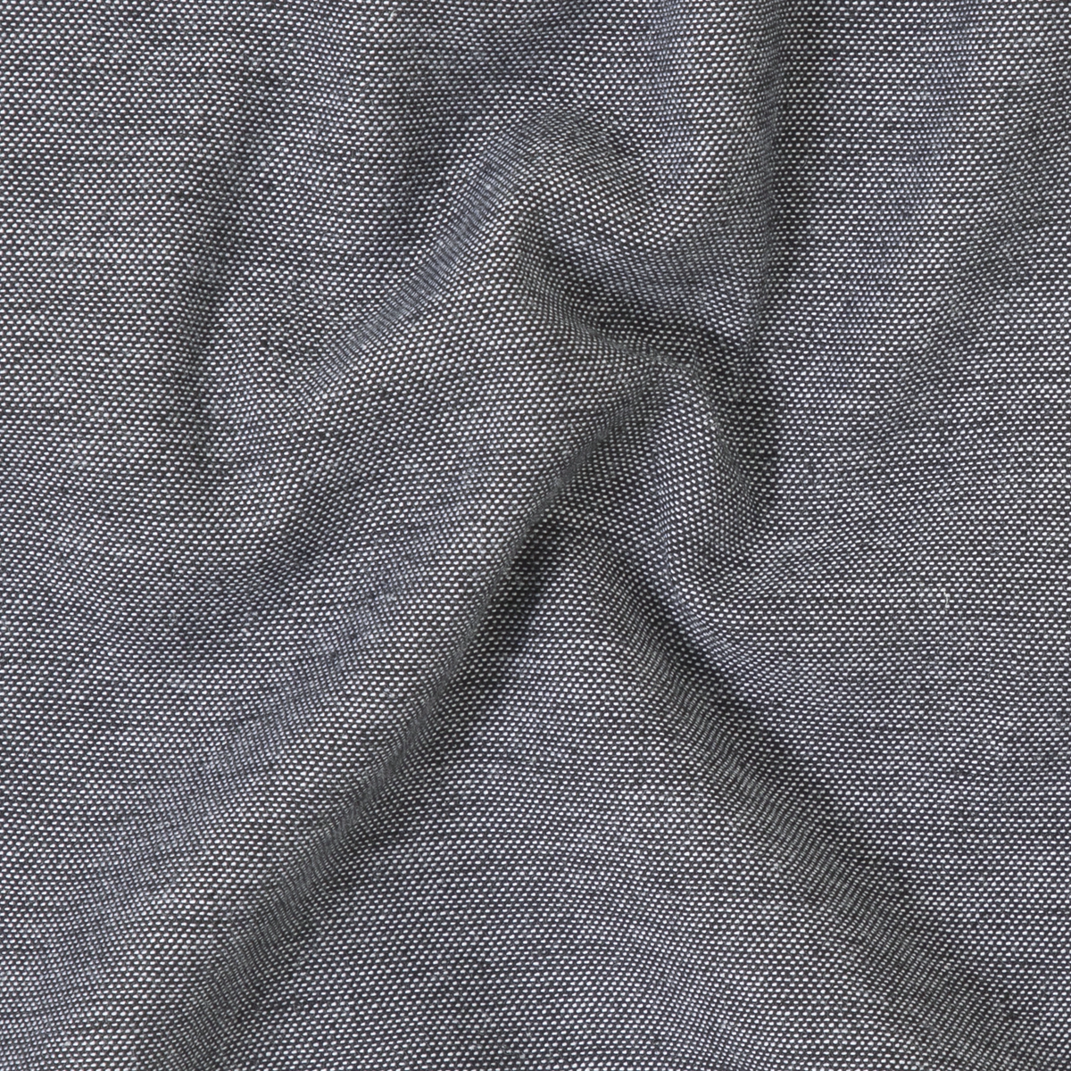 Close-up of black textured fabric with a subtle pattern on the Stretch Linen Short, crafted from premium European linen