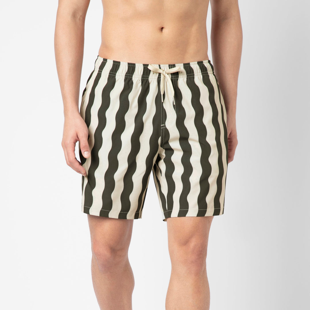 Stretch Swim Trunk (Clearance) in Orca Wavy Stripe, 7" inseam, shown front facing on a model against a plain white background.