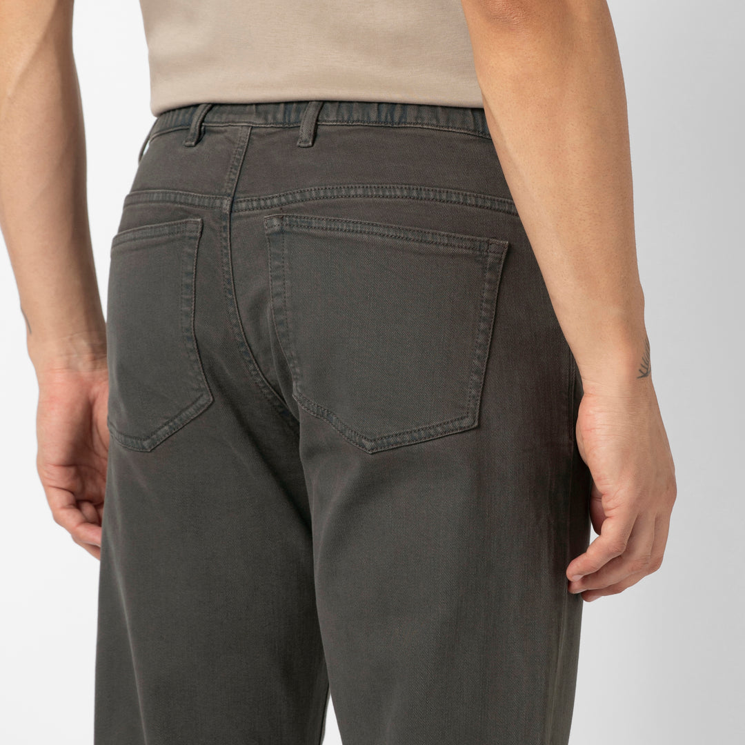 Stretch Travel Jean Coal back on model