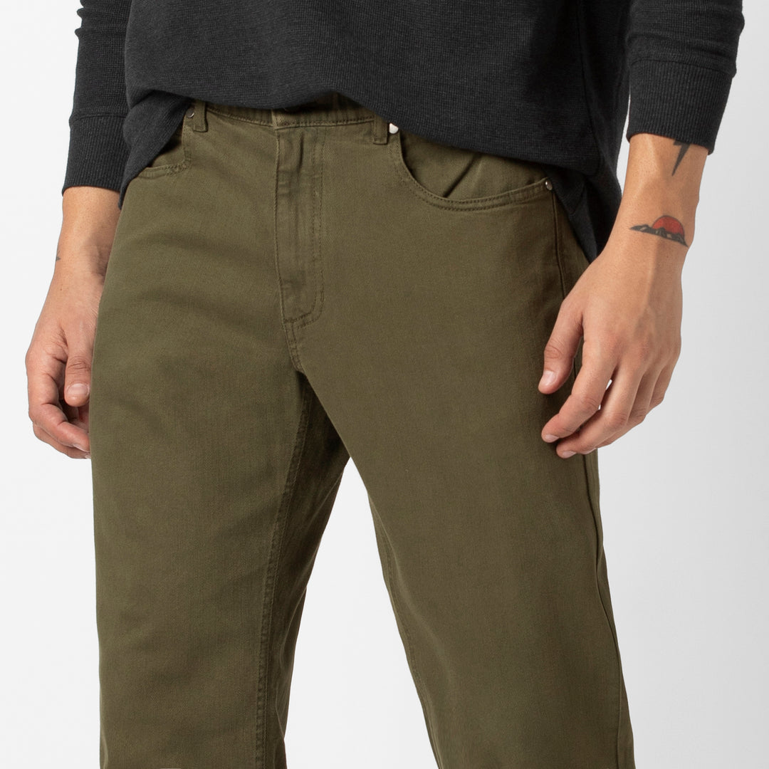 Stretch Travel Jean Crocodile close up on model