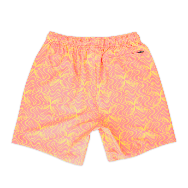 Stretch Swim 7" Groovy back, a light pink with bright yellow psychedelic ball shaped pattern with an elastic waistband and back right zippered pocket