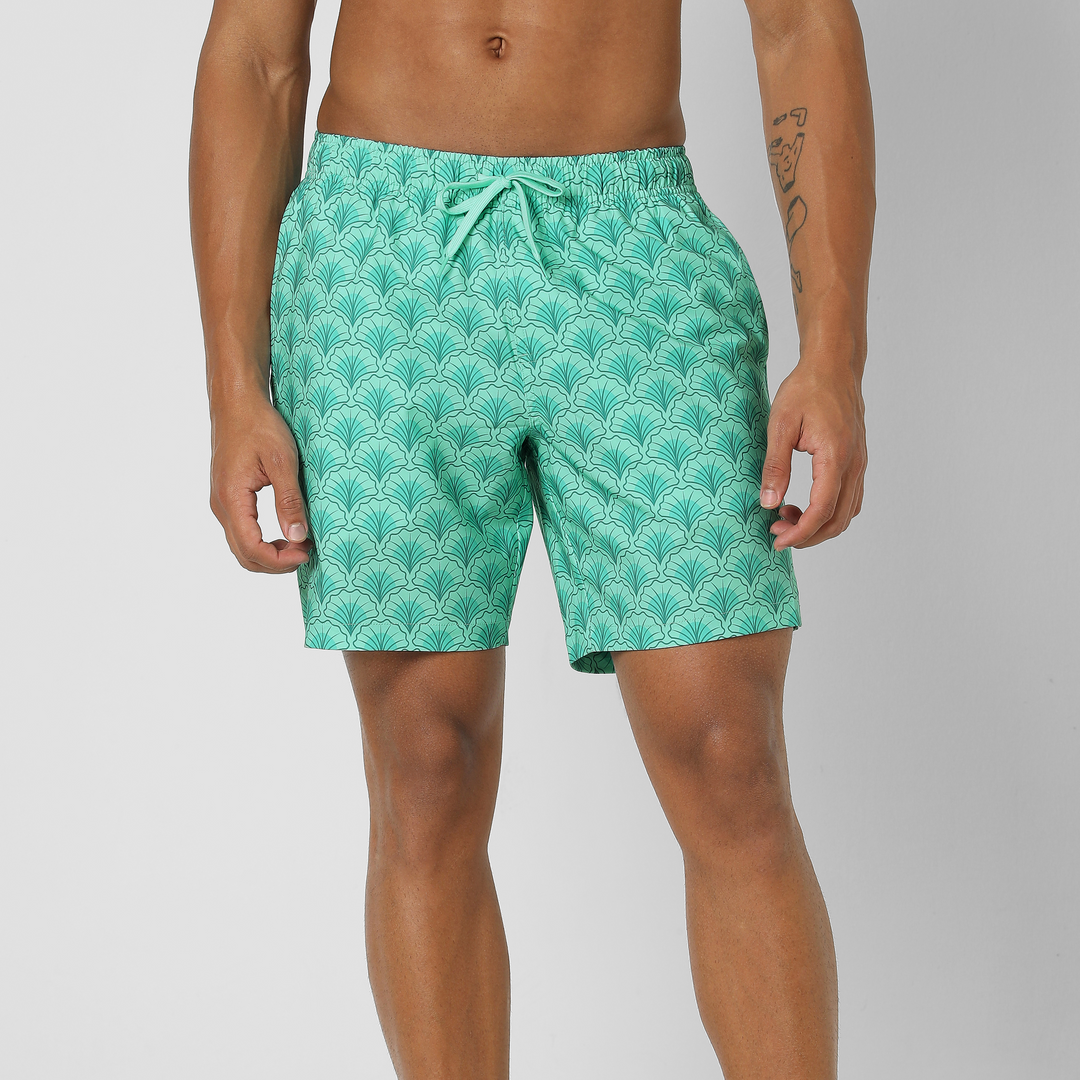 Stretch Swim Trunk (Clearance) in Shell, 7" inseam, shown front facing on a model against a plain white background.