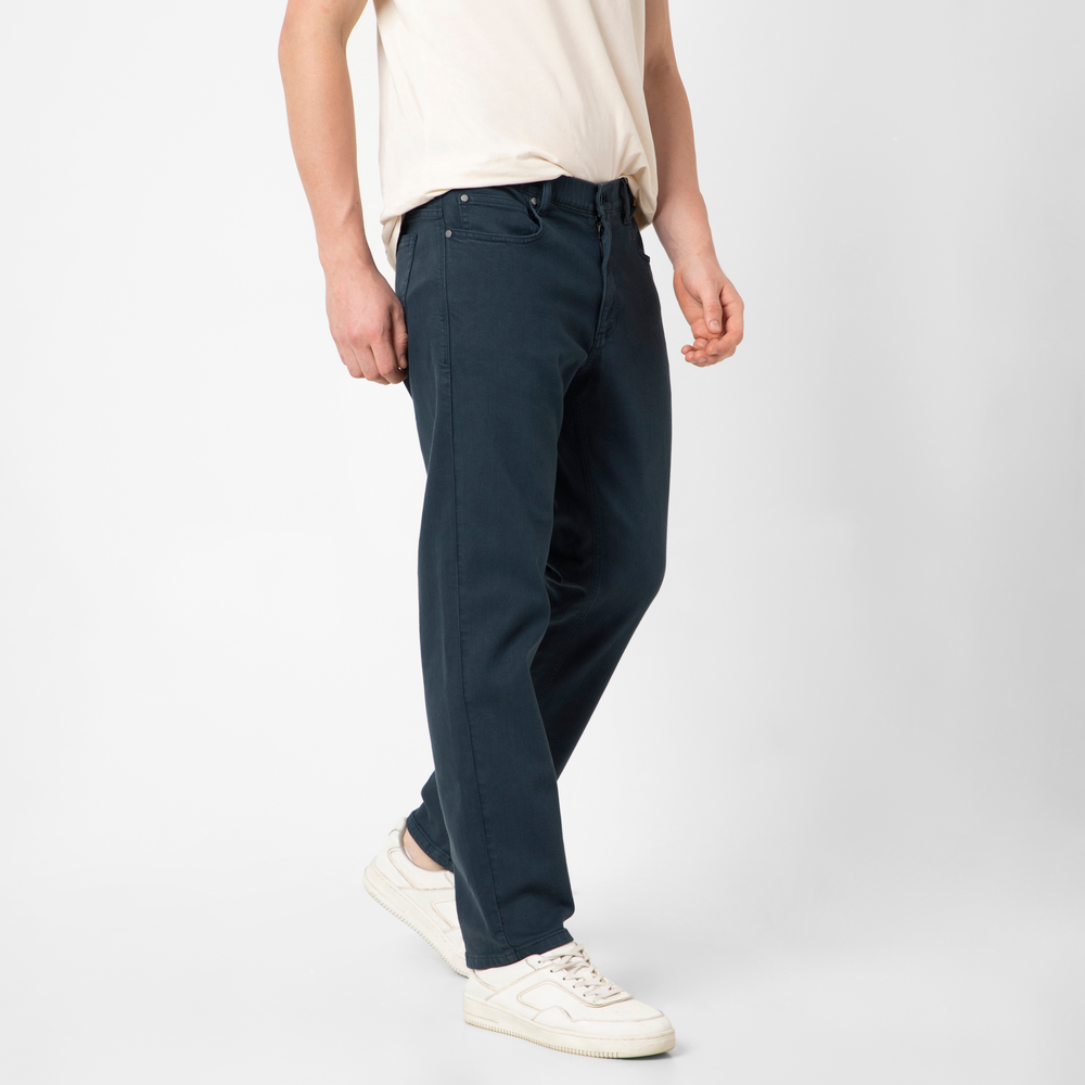 Stretch Travel Jean Navy side on model