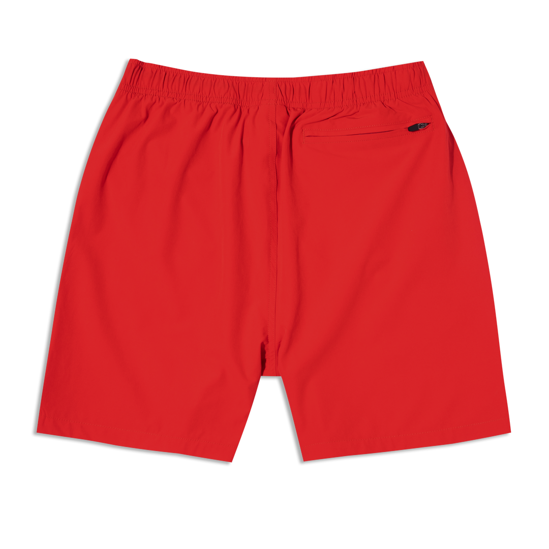 Stretch Swim Trunk (Clearance) in solid Red laid flat, back view, 7" inseam, with an elastic waistband and a zippered back right pocket.