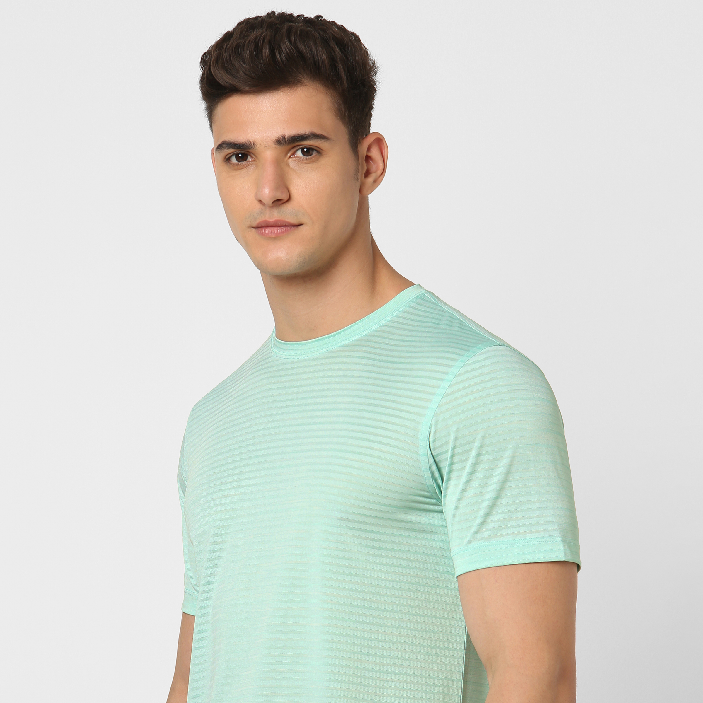 Stride Tee Mint close up on model