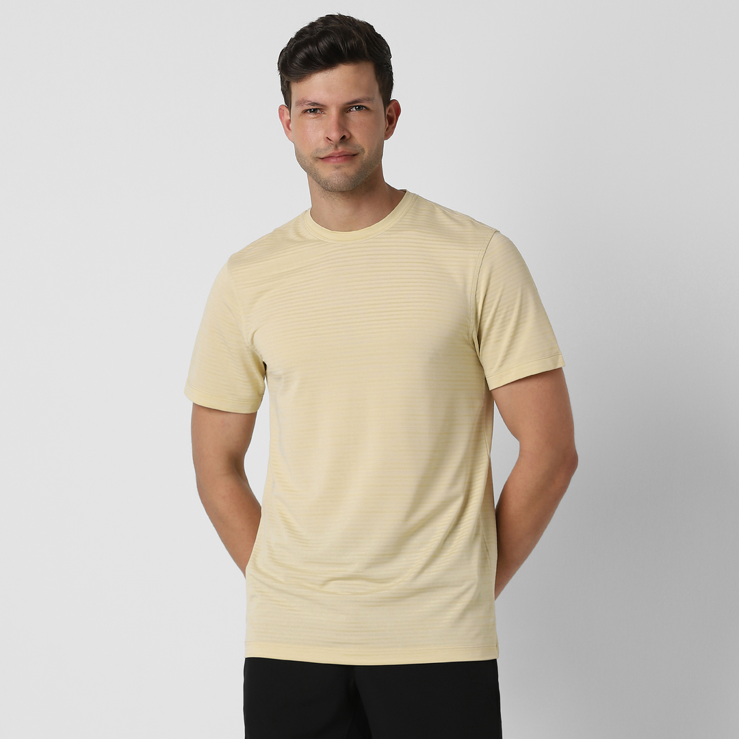 Stride Tee Sand front on model