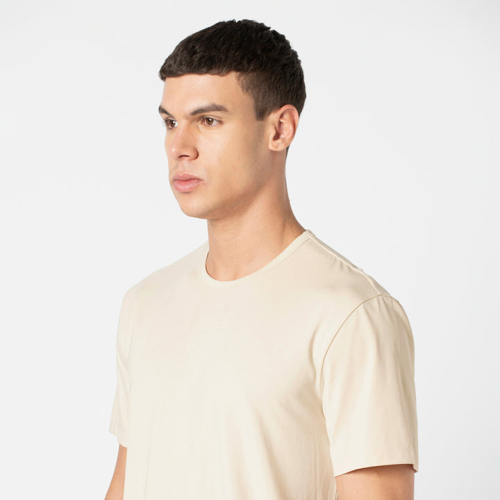 Supima Curved Tee Bone close up on model