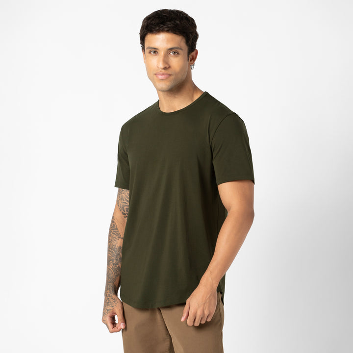 Supima Curved Tee Dark Pine side on model
