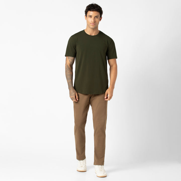 Supima Curved Tee Dark Pine full body on model