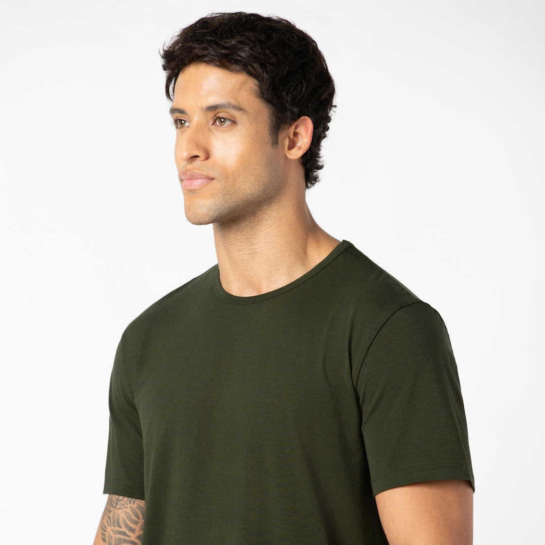Supima Curved Tee Dark PIne close up on model