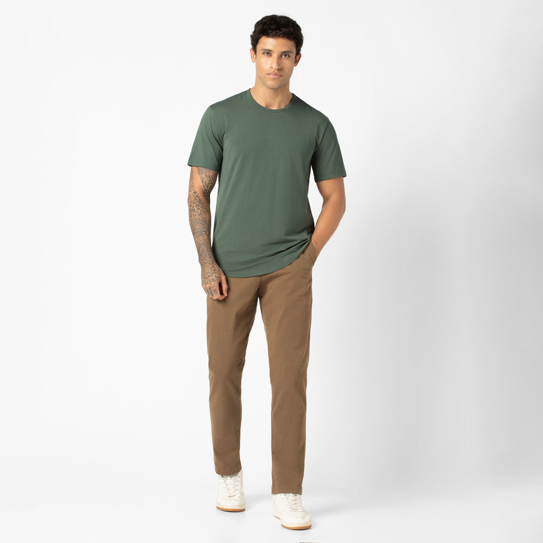 Supima Curved Tee Dark Sage full body on model