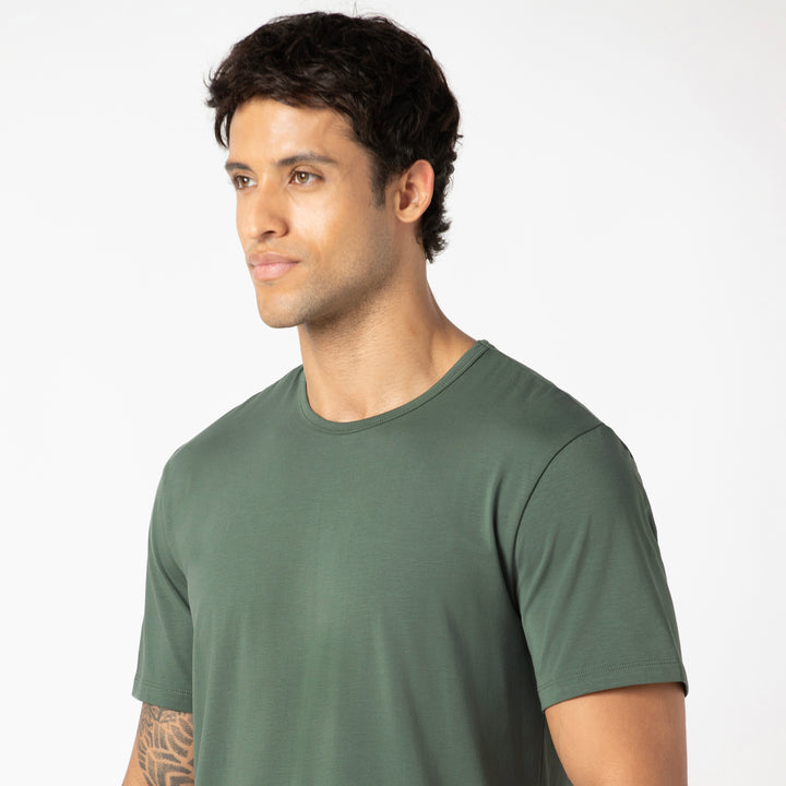 Supima Curved Tee Dark Sage close up on model