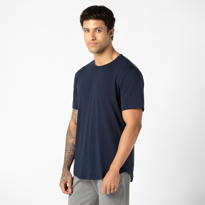 Supima Curved Tee Navy side on model