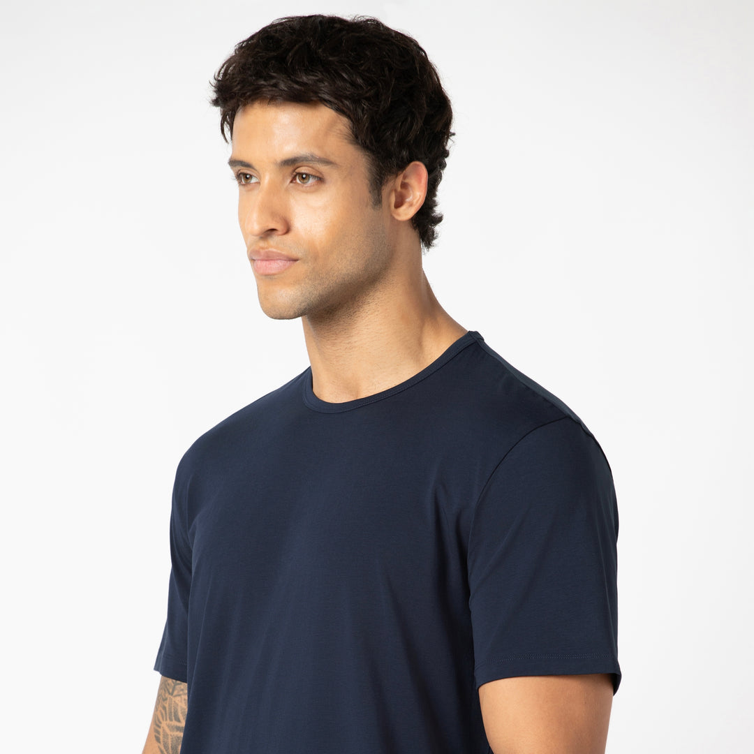 Supima Curved Tee Navy close up on model