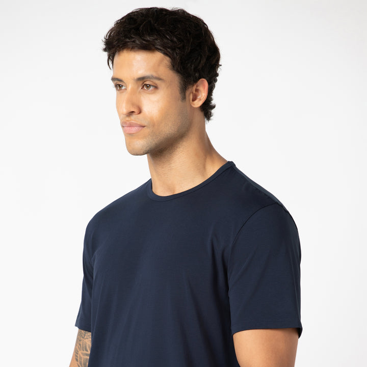Supima Curved Tee Navy close up on model