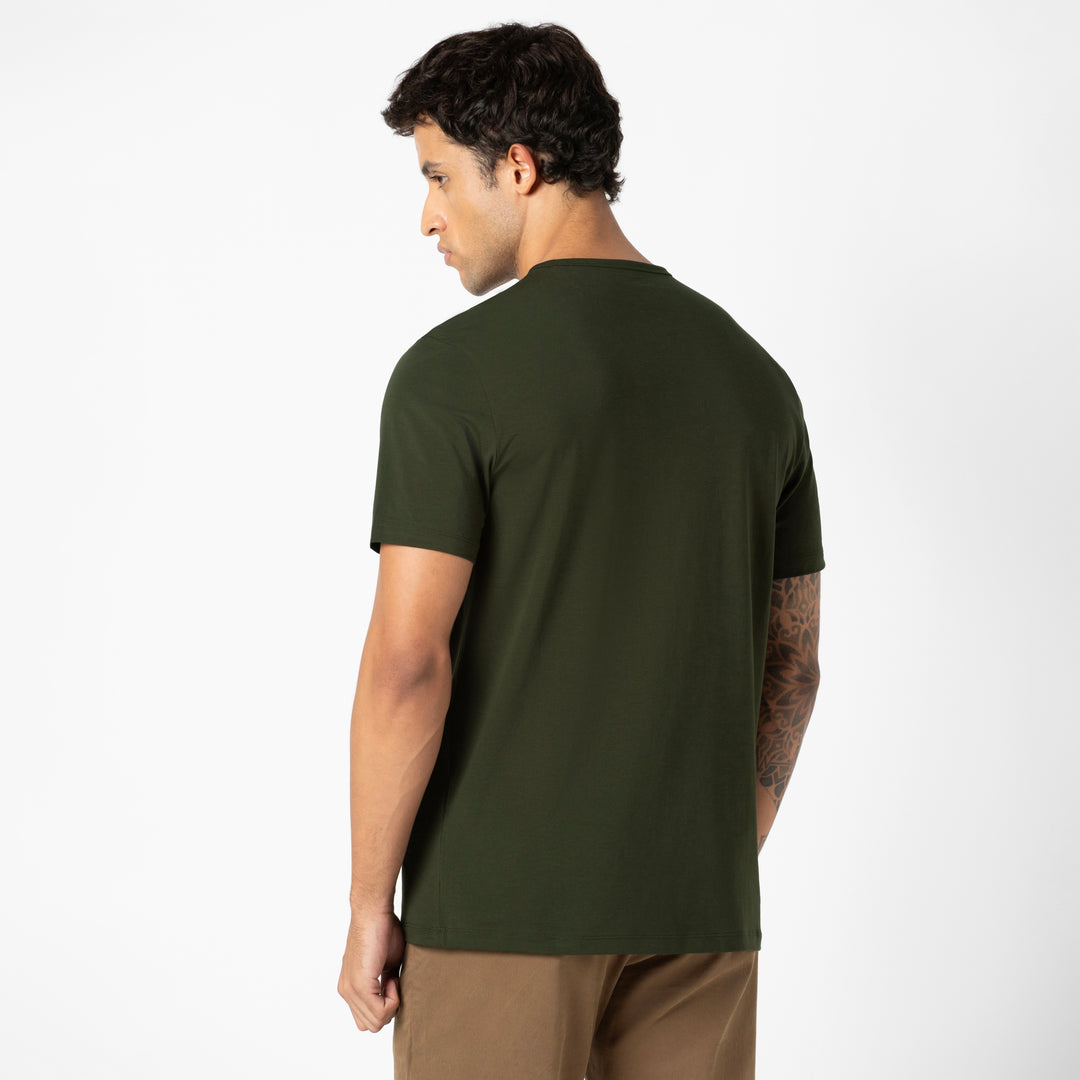 Supima Tee Dark Pine full body on model
