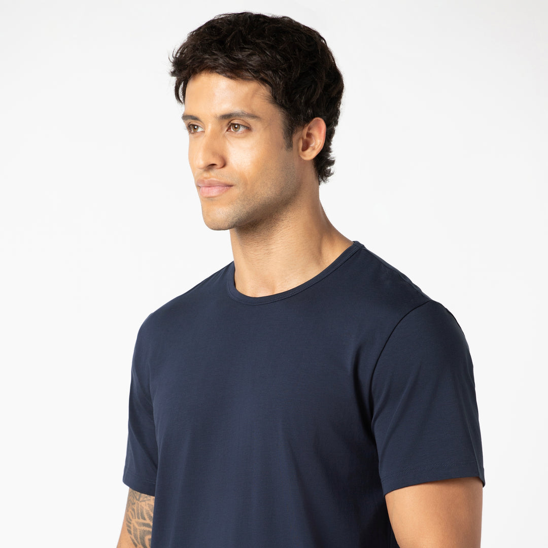 Supima Tee Navy close up on model
