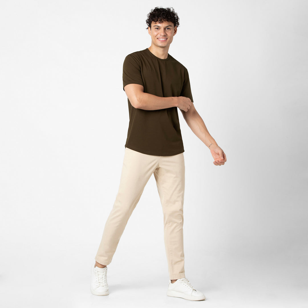 Supima Curved Tee Bark full body on model with Stretch Chino Pant Sand Dune
