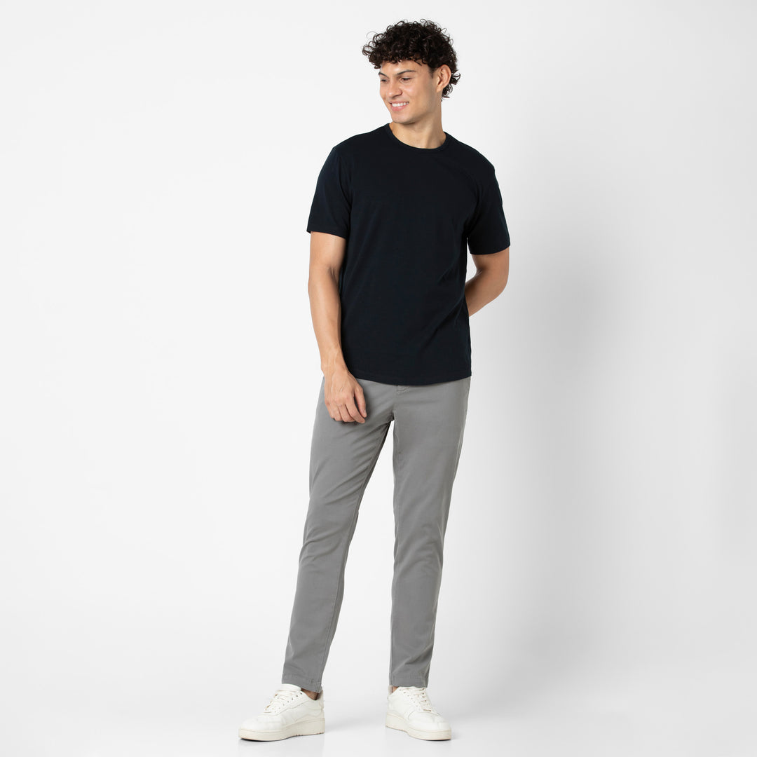 Supima Curved Tee Black full body on model with Stretch Chino Pant Grey