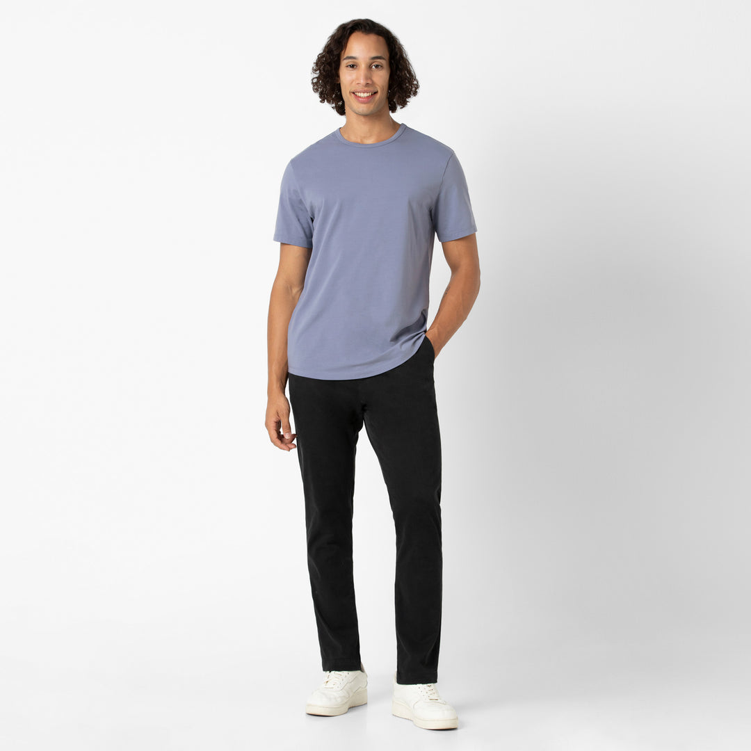 Supima Curved Tee Flint full body on model with Stretch Chino Pant Black