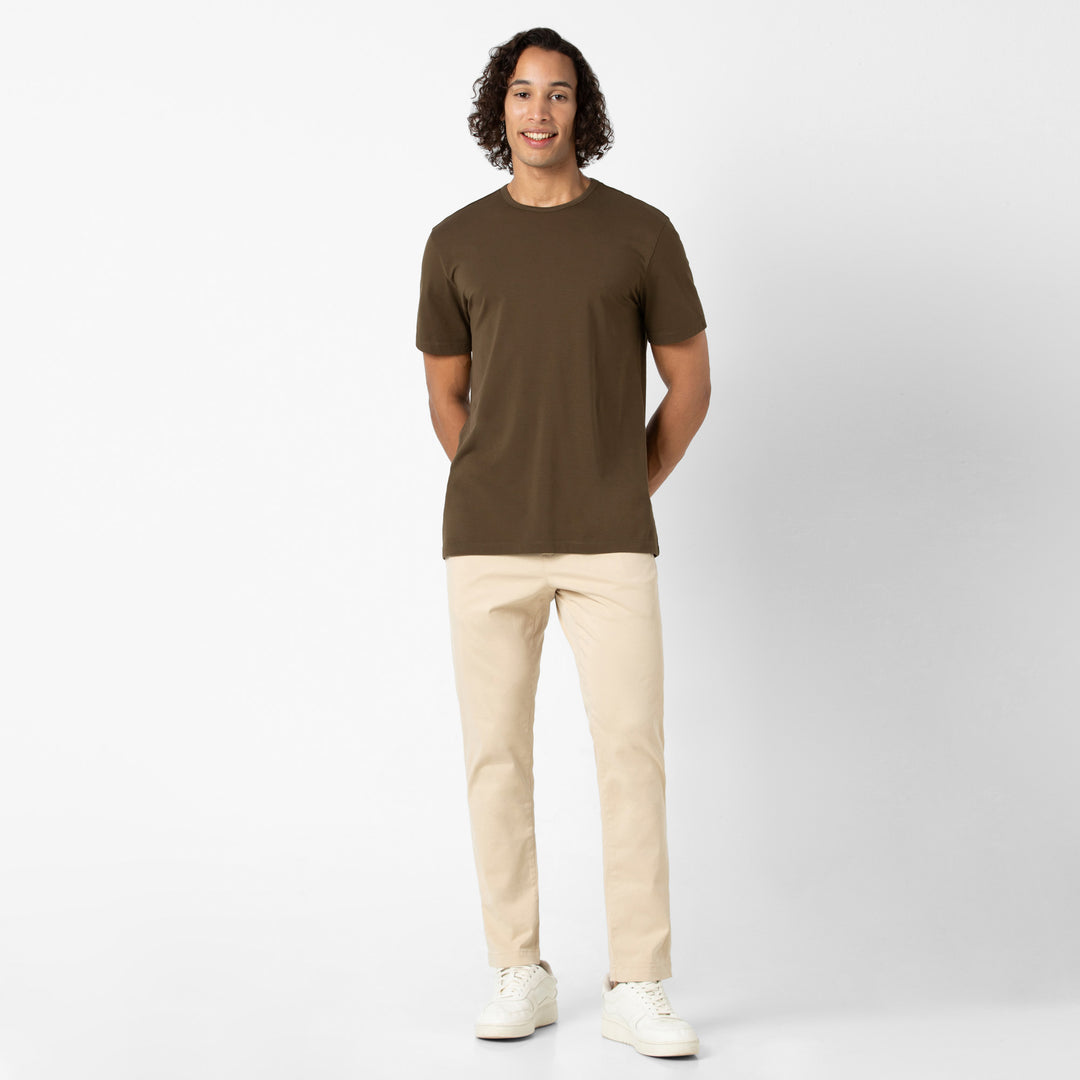 Supima Tee Bark full body on model with Stretch Chino Pant Sand Dune