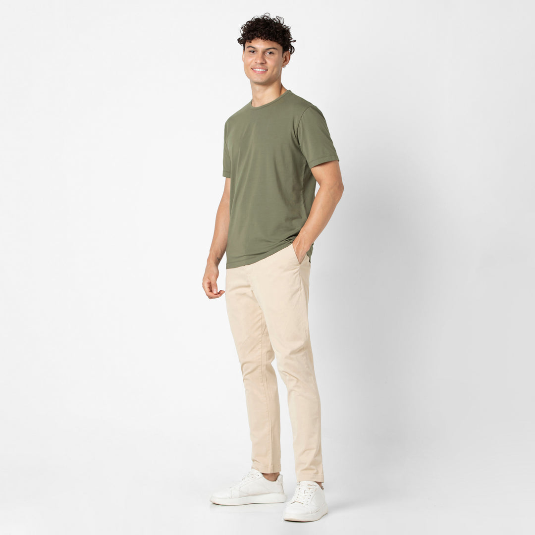 Supima Tee Fern full body on model with Stretch Chino Pant Sand Dune