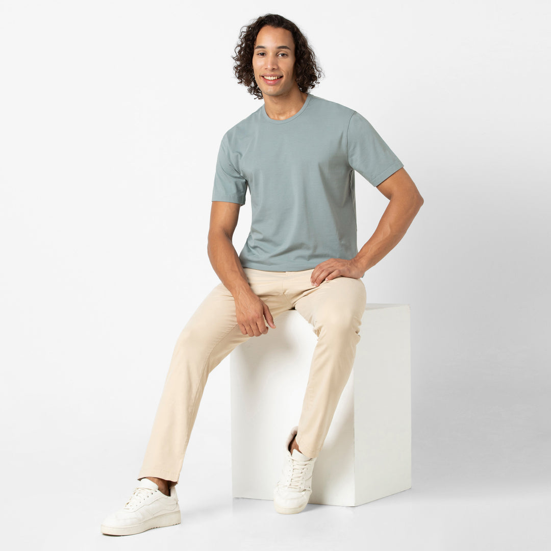 Supima Tee Shark full body on model with Stretch Chino Pant Sand Dune