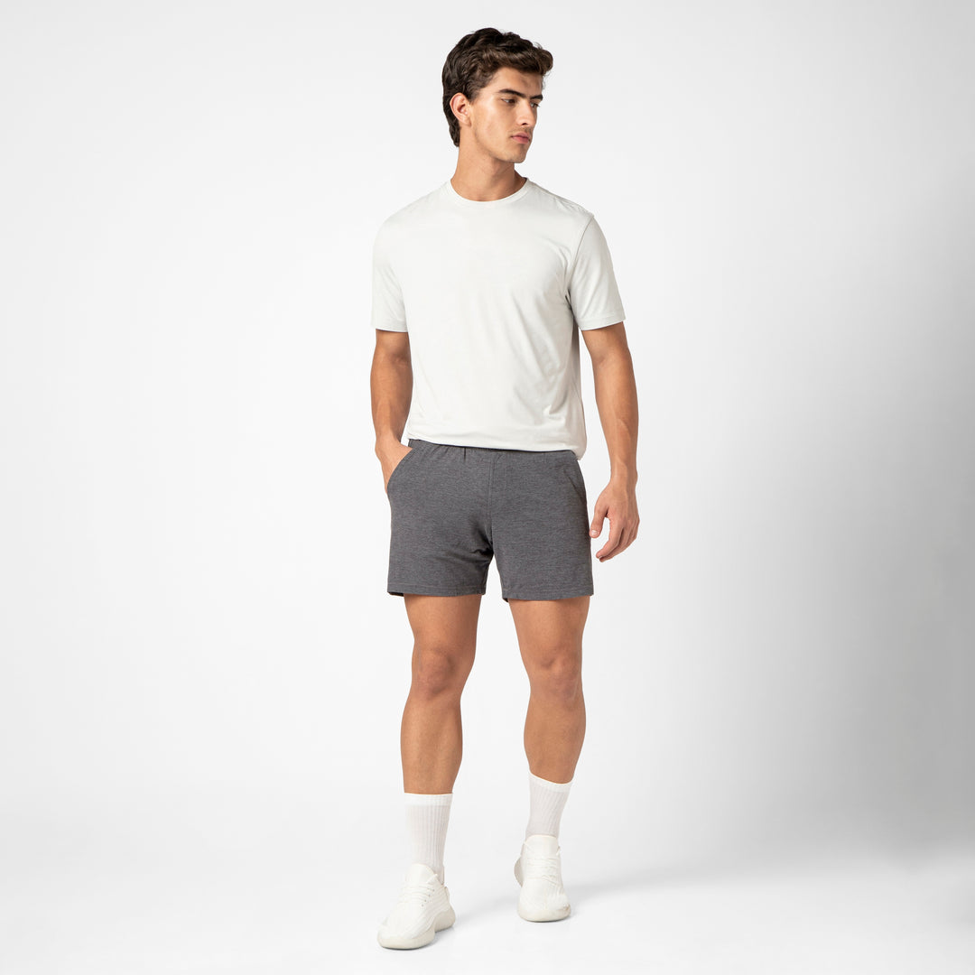 Tech Short 5 Charcoal full body on model