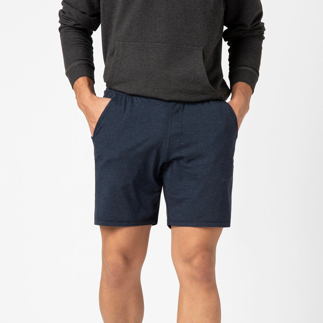 Tech Short 7 Navy on front on model