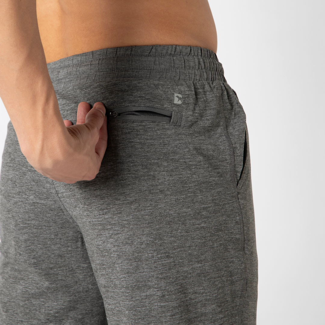 Tech Jogger Grey close up back zipper pocket on model