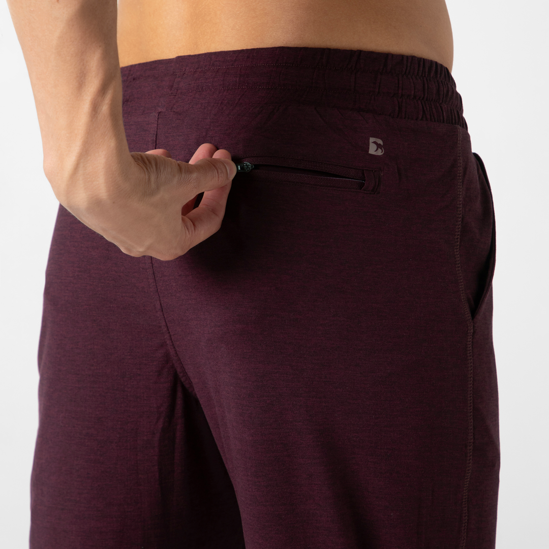 Tech Jogger Maroon close up back zipper pocket on model