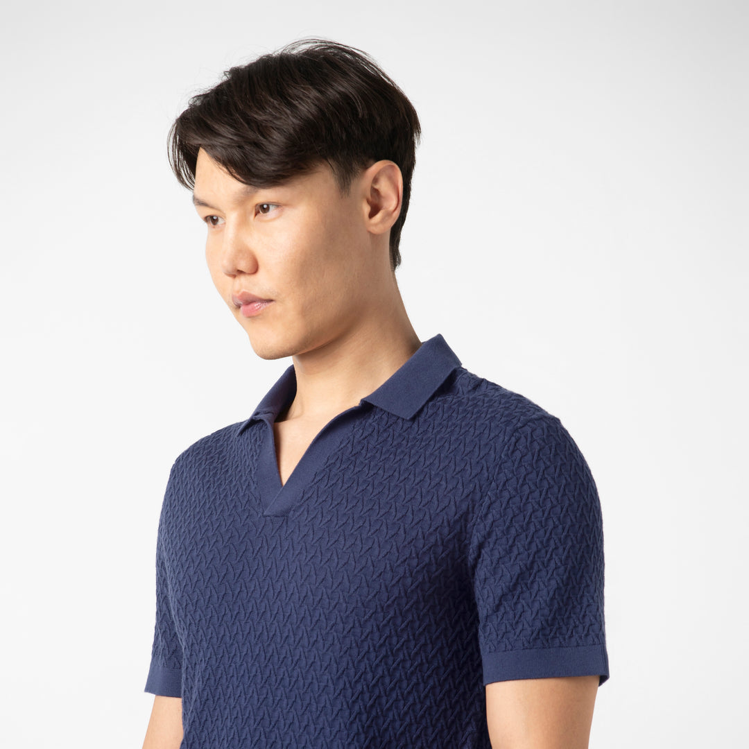Textured Knit Sweater Polo Navy close up on model