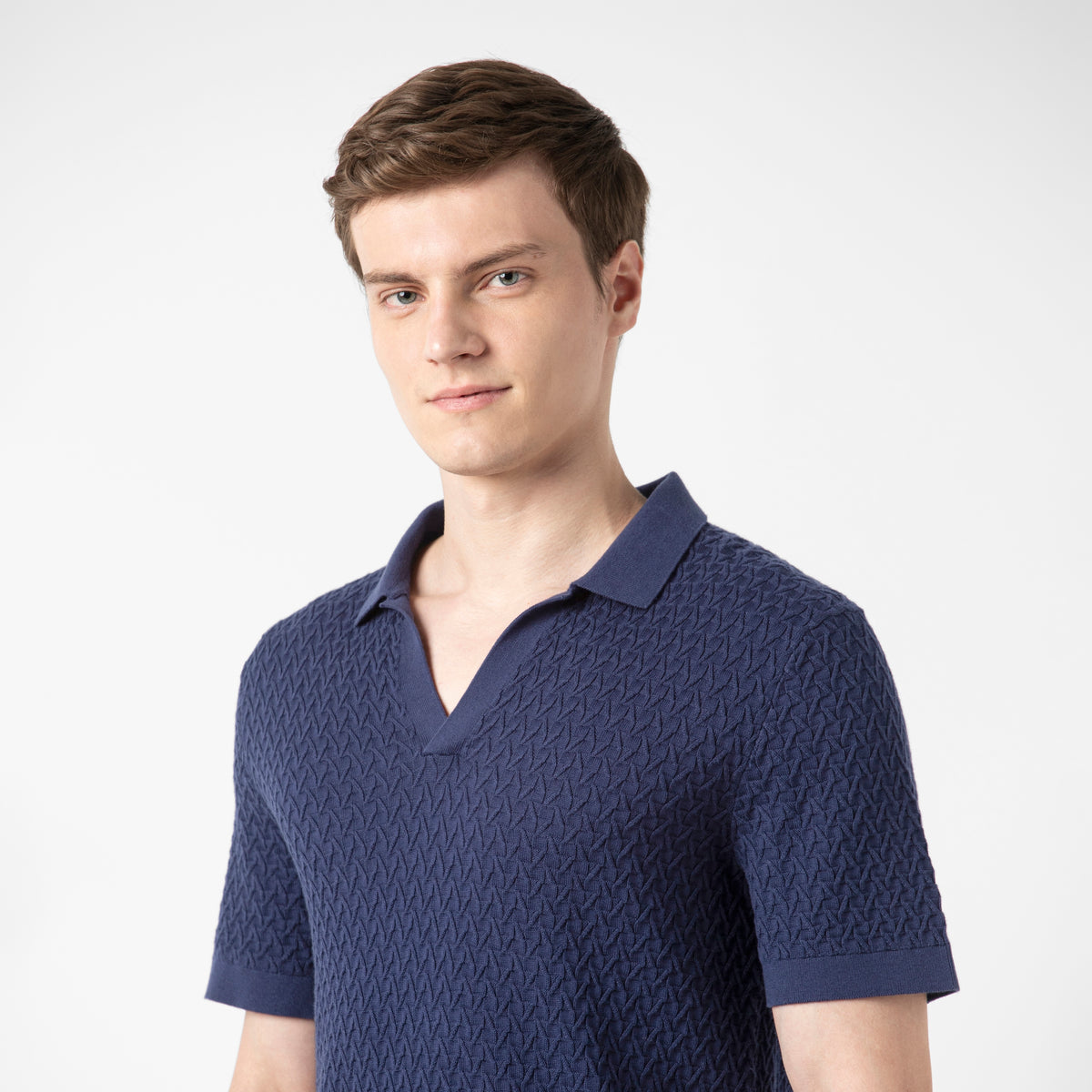 Textured Knit Sweater Polo Navy close up on model