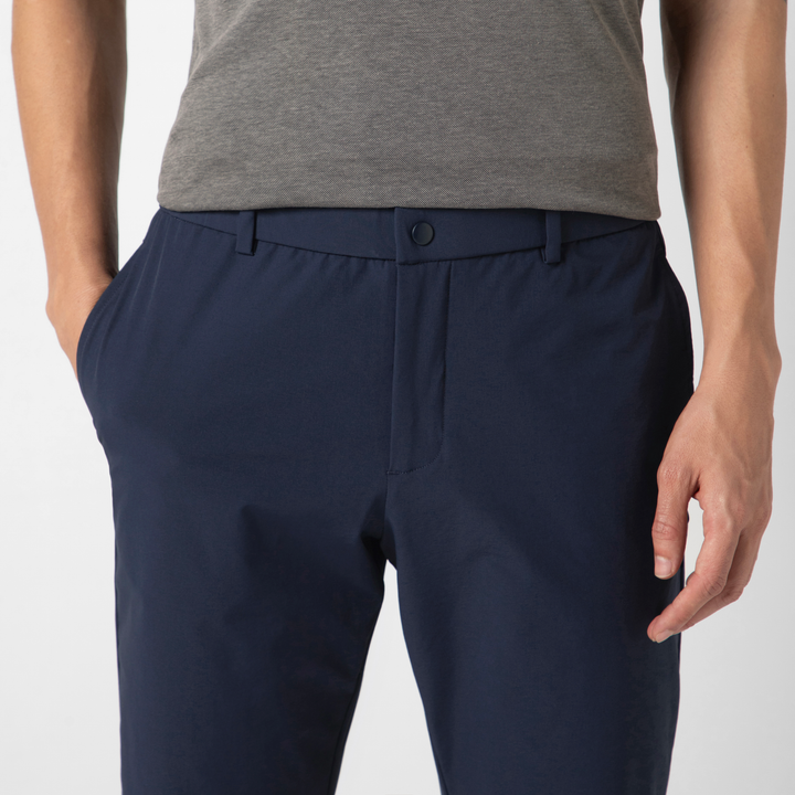 Tour Pant Navy close up front on model